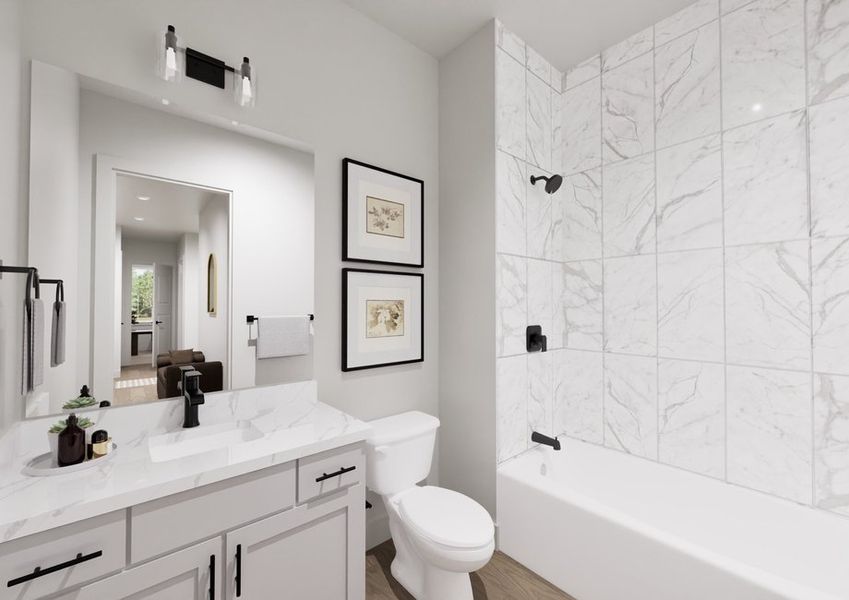 Modern bathroom with white tile, a bathtub, single-sink vanity, toilet, wall-mounted mirror, two framed pictures, and a view into an adjacent room. Modern bathroom with white tile, a bathtub, single-sink vanity, toilet, wall-mounted mirror, two framed pictures, and a view into an adjacent room.