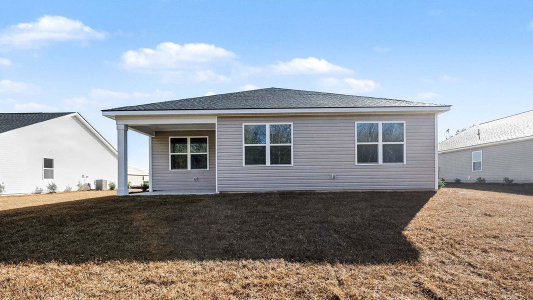 Exterior details and patio area of a home in Pinewood Estates, Conway (Image 4). Exterior details and patio area of a home in Pinewood Estates, Conway (Image 4).