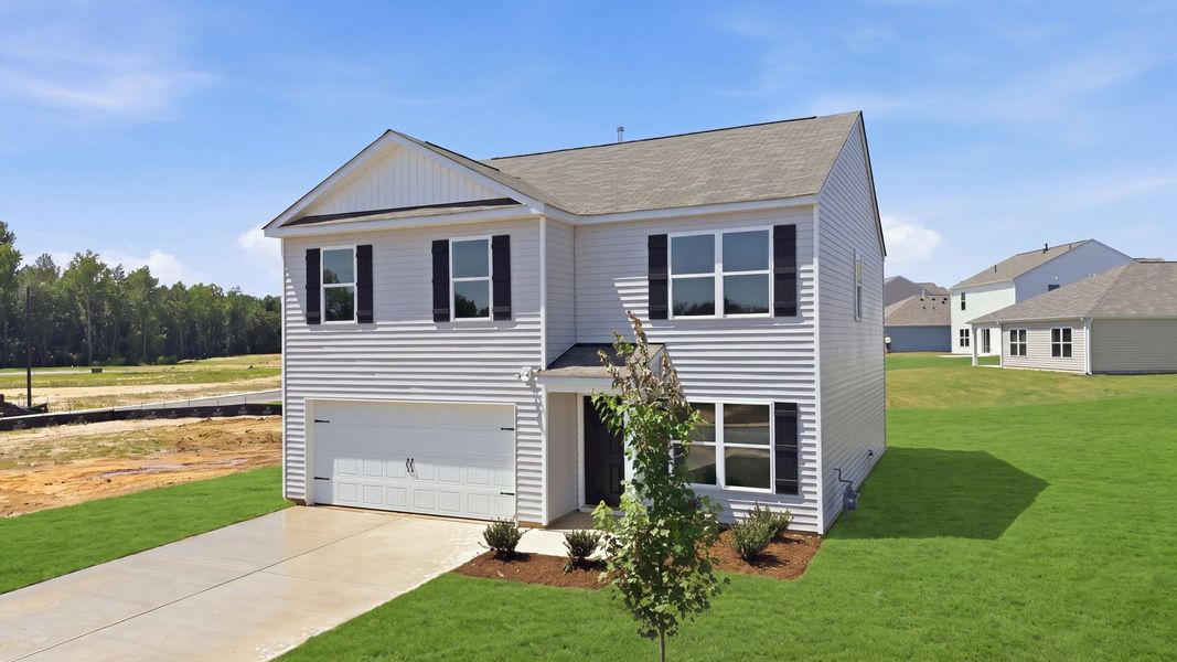 Front exterior of a new home in Hunter Hill, Rocky Mount, NC, highlighting curb appeal (Image 22). Front exterior of a new home in Hunter Hill, Rocky Mount, NC, highlighting curb appeal (Image 22).