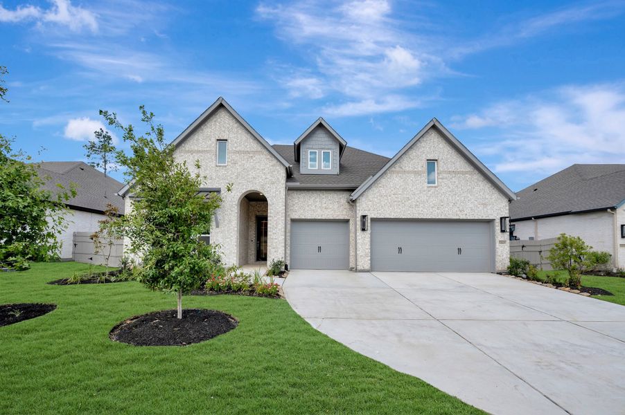 Front exterior of a new home in ARTAVIA - Parkview Collection, Conroe, TX, highlighting curb appeal (Image 26).