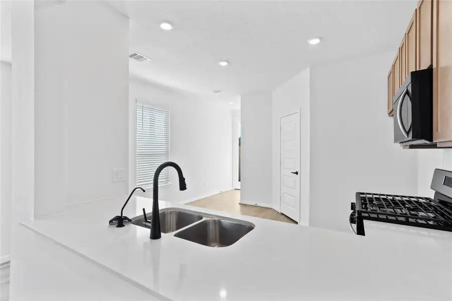 The gorgeous Silestone countertops are featured here in Linen Cream. The gorgeous Silestone countertops are featured here in Linen Cream.