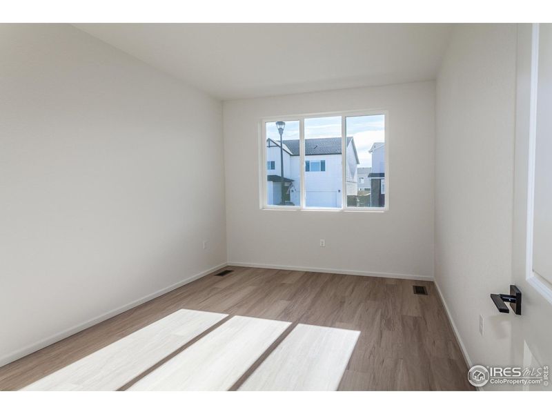Spacious, unfurnished interior of a new home in Bloom Trailblazer Collection - Single Family Homes, Fort Collins (Image 19).