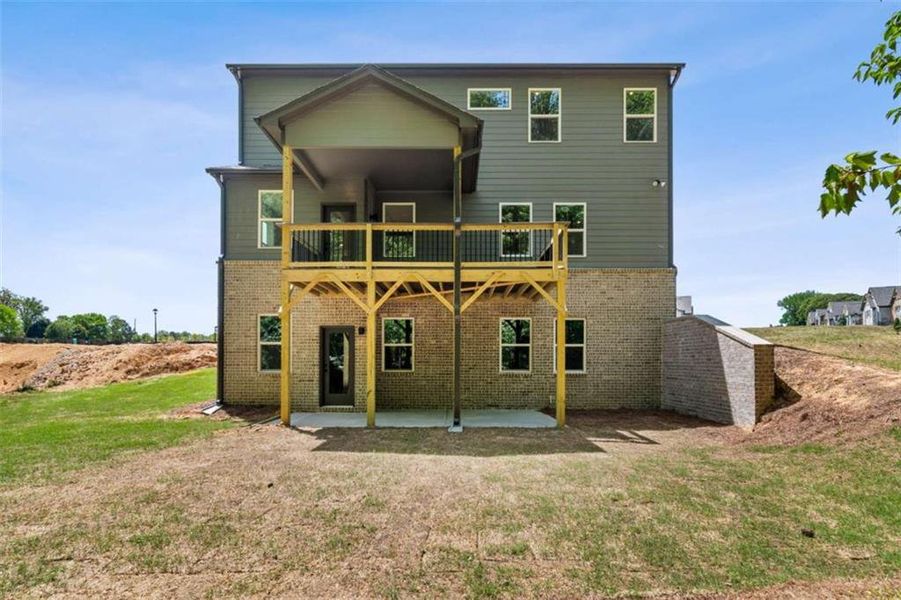 Exterior details and patio area of a home in The Paddocks at Doc Hughes, Buford (Image 3). Exterior details and patio area of a home in The Paddocks at Doc Hughes, Buford (Image 3).