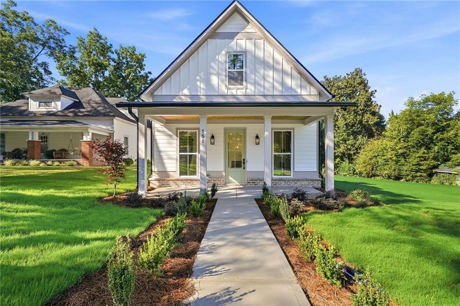 Front exterior of a new home in , Ball Ground, GA, highlighting curb appeal (Image 35).