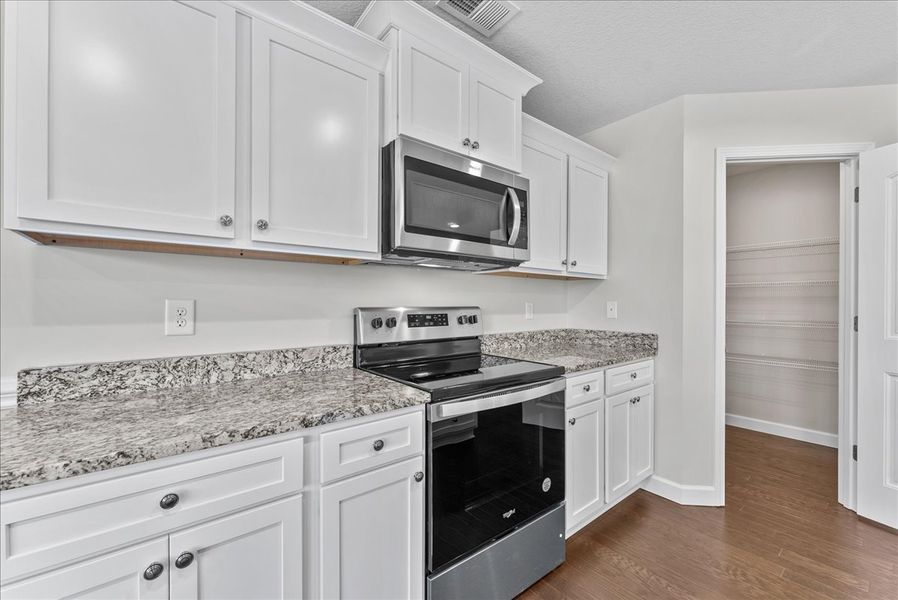 Representative furnished interior of a home built from the Emilia by Enchanted Homes in Guadalupe Heights, Seguin (Image 12).