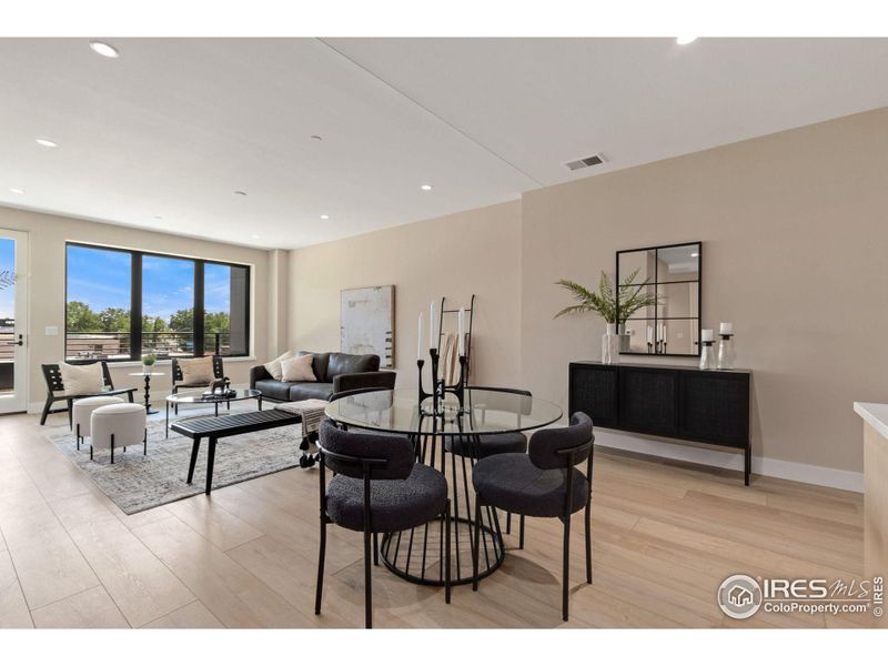 Seamless, open concept layout has plenty of room for a dining and living area, along with overflow living/dining space onto the 30 foot balcony, overlooking the heart of Downtown Loveland.