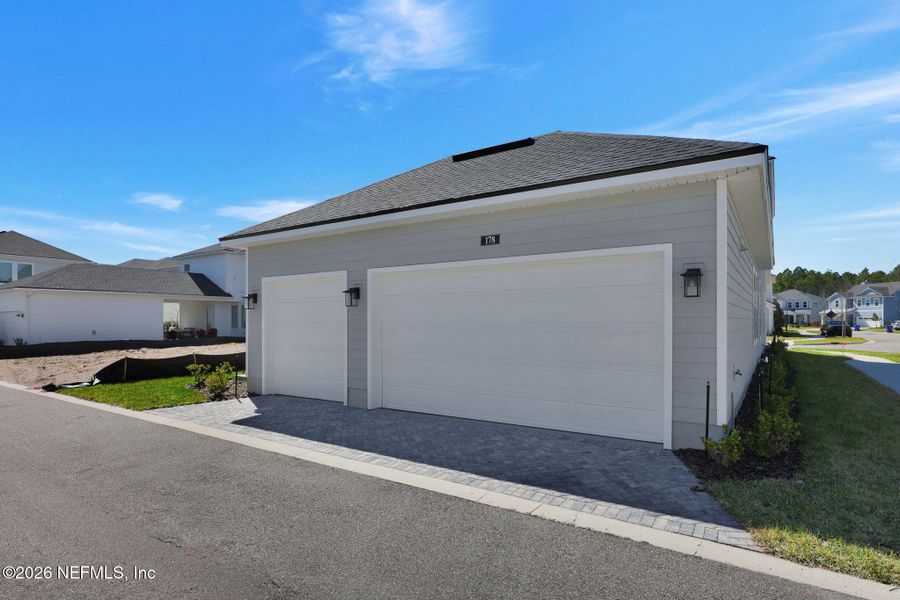 Exterior details and patio area of a home in Seabrook Village at Seabrook, Ponte Vedra (Image 24).