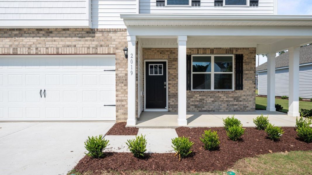 Front exterior of a new home in West New Bern, New Bern, NC, highlighting curb appeal (Image 15).