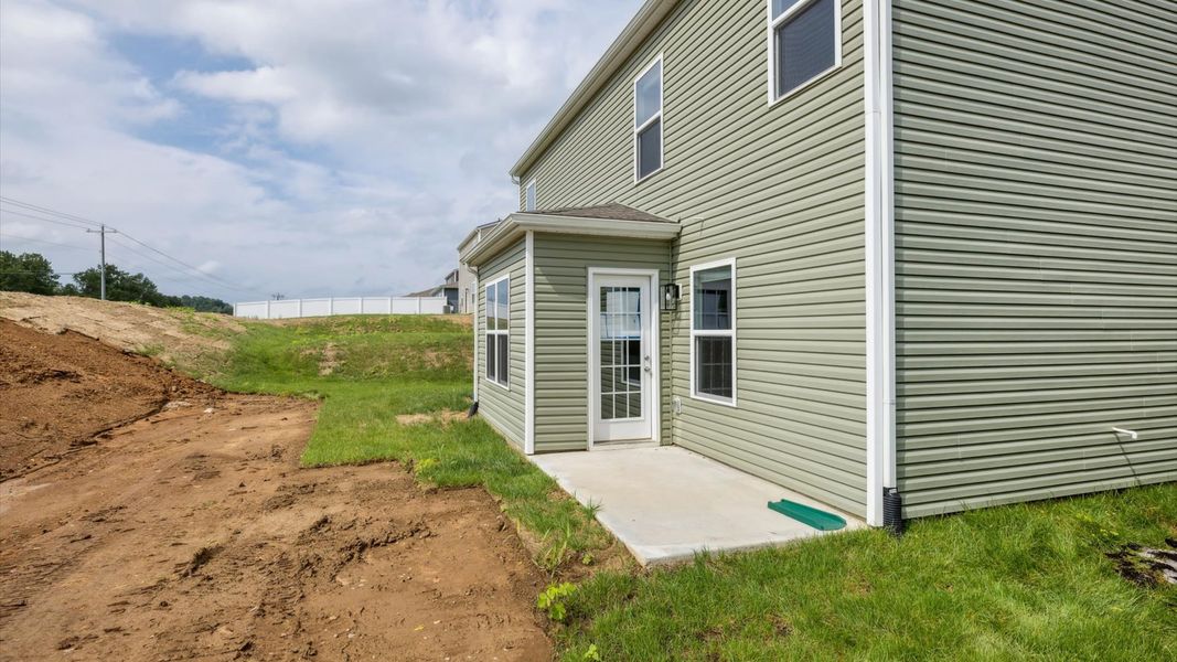 Front exterior of a new home in Emory Creek, Harriman, TN, highlighting curb appeal (Image 2). Front exterior of a new home in Emory Creek, Harriman, TN, highlighting curb appeal (Image 2).