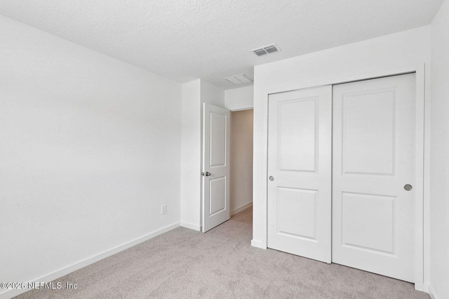 Spacious, unfurnished interior of a new home in Flagler Village - Signature Series, Palm Coast (Image 19).