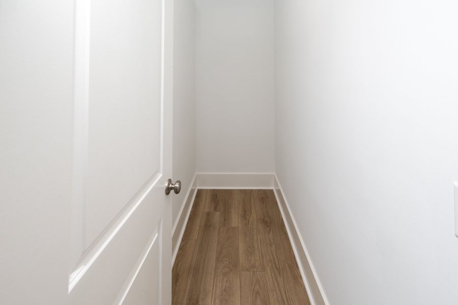 Representative unfurnished interior of a home built from the Hanover by Bill Clark Homes in Osprey Landing, Southport (Image 18).