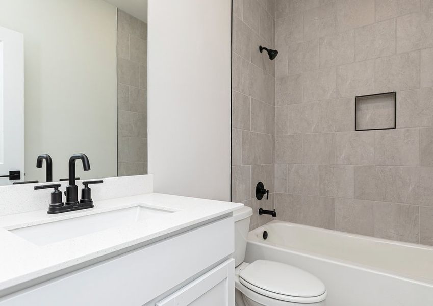 Representative furnished interior of a home built from the Lanier by LGI Homes in Mount Tabor Pointe, Dallas (Image 6).