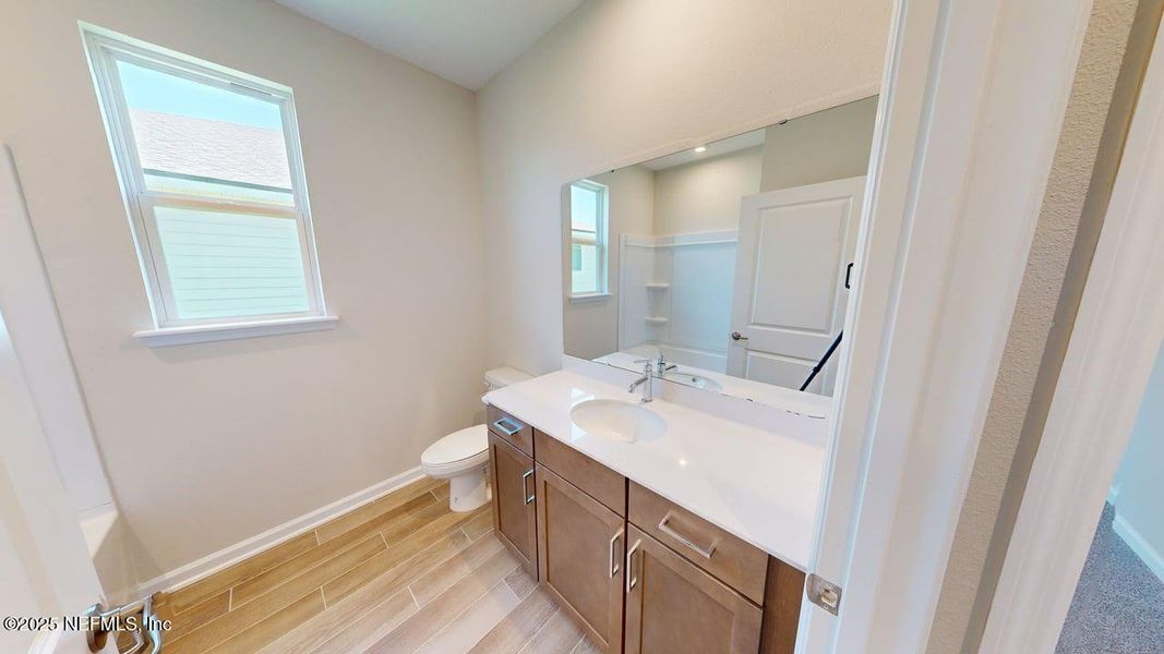 Furnished interior view inside a new home in Lakes at Bella Lago, Green Cove Springs (Image 6).