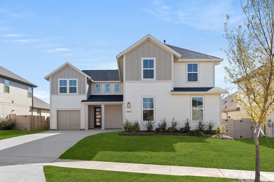 Front exterior of a new home in Inspiration Collection 60 at Painted Tree, McKinney, TX, highlighting curb appeal (Image 1). Front exterior of a new home in Inspiration Collection 60 at Painted Tree, McKinney, TX, highlighting curb appeal (Image 1).