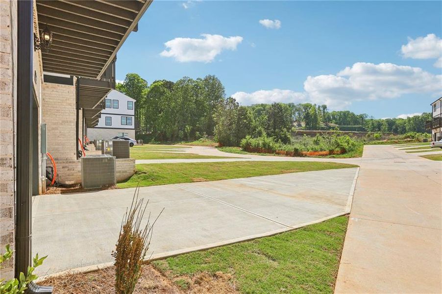 Exterior details and patio area of a home in Hemingway - Highland Series, Cumming (Image 3).