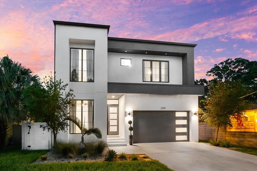 Front exterior of a new home in , Tampa, FL, highlighting curb appeal (Image 2).