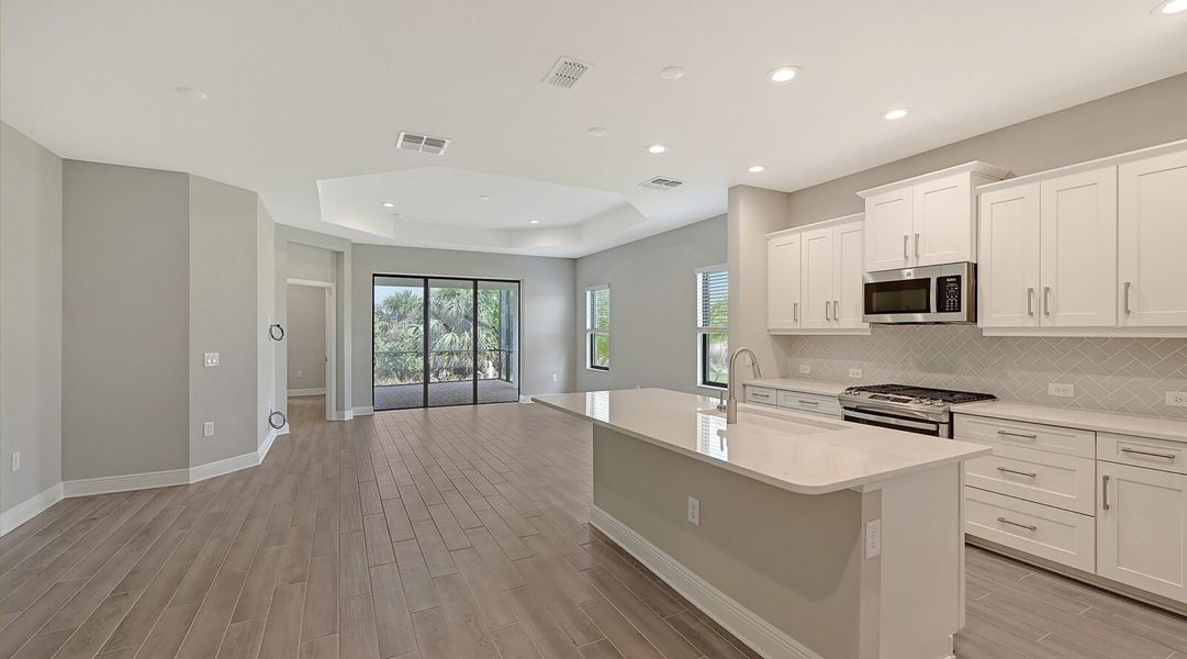 Furnished interior view inside a new home in Boca Royale Golf and Country Club at Wellen Park, Englewood (Image 5).