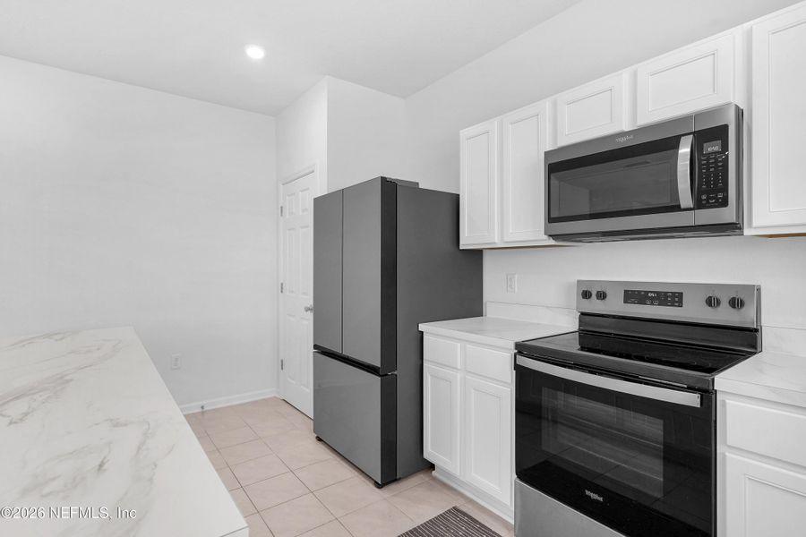 Furnished interior view inside a new home in , St. Augustine (Image 19).