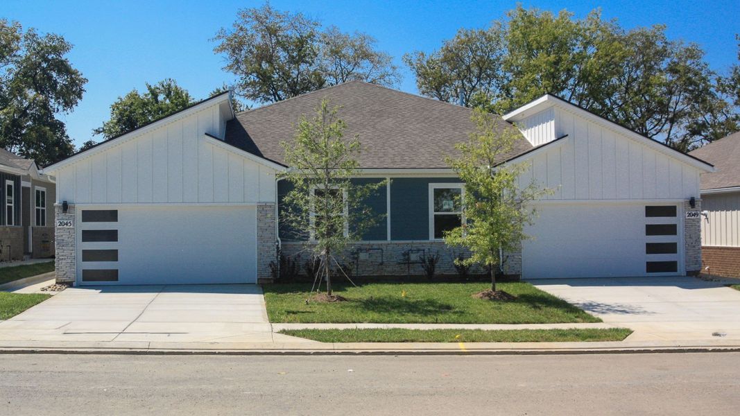 Front exterior of a new home in Nexus South, Gallatin, TN, highlighting curb appeal (Image 21). Front exterior of a new home in Nexus South, Gallatin, TN, highlighting curb appeal (Image 21).