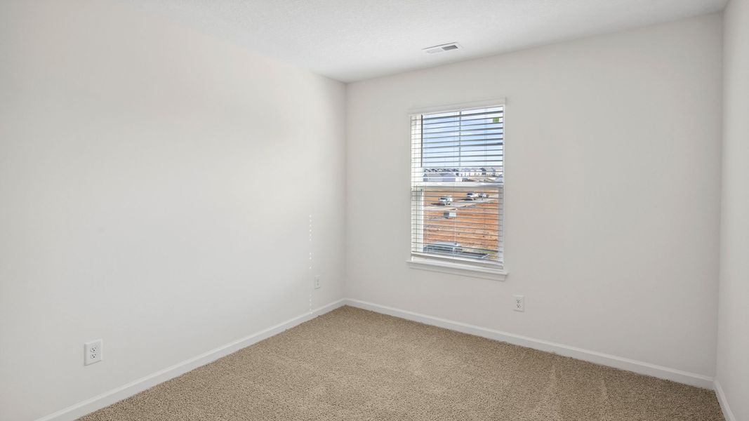 Representative unfurnished interior of a home built from the Bennet by D.R. Horton in The Hideaway at Fox Meadows, Bluff City (Image 21).