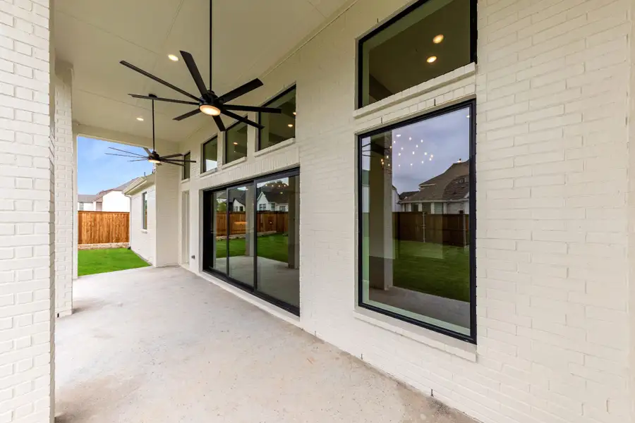Representative exterior details of a home built from the 7042 by Tradition Homes in Mustang Lakes, McKinney (Image 4).