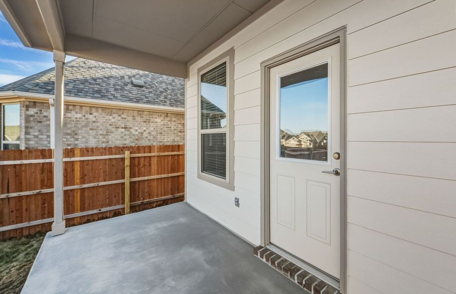 Exterior details and patio area of a home in Saddleback at Santa Rita Ranch, Liberty Hill (Image 27).