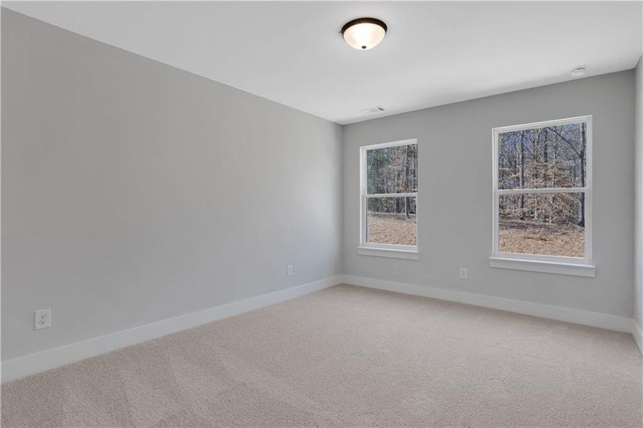 Spacious, unfurnished interior of a new home in Cambridge, Flowery Branch (Image 24).