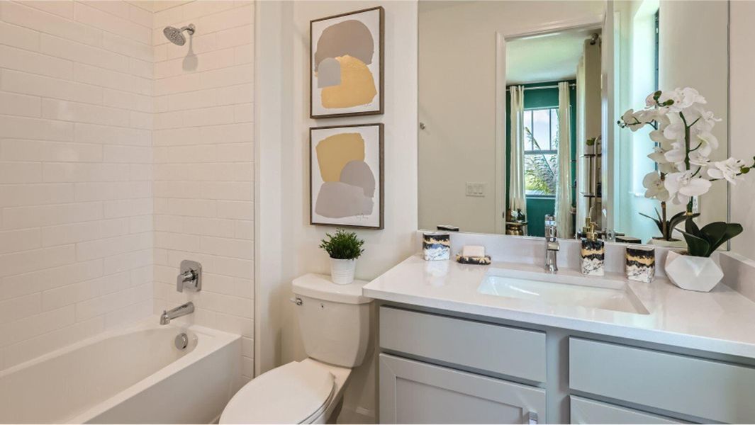 Furnished interior view inside a new home in Tesoro Club, Port St. Lucie (Image 2).