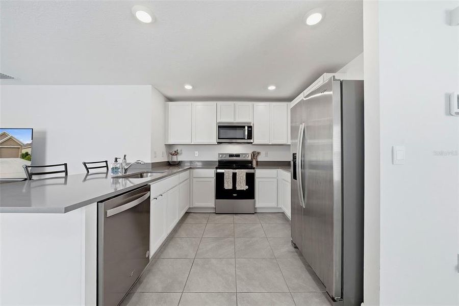 Furnished interior view inside a new home in Harvest Ridge, Zephyrhills (Image 6).