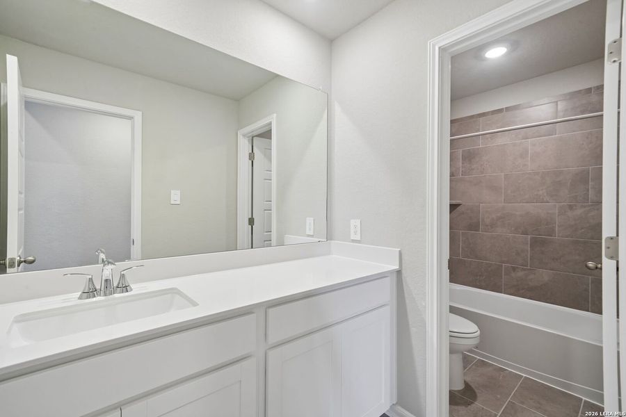 Furnished interior view inside a new home in Thomas Pond, San Antonio (Image 8).