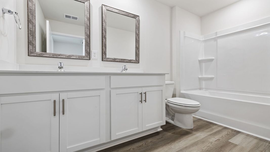 Furnished interior view inside a new home in Bentley Park, Greenwood (Image 9). Furnished interior view inside a new home in Bentley Park, Greenwood (Image 9).