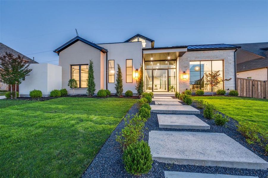Front exterior of a new home in , Frisco, TX, highlighting curb appeal (Image 1). Front exterior of a new home in , Frisco, TX, highlighting curb appeal (Image 1).