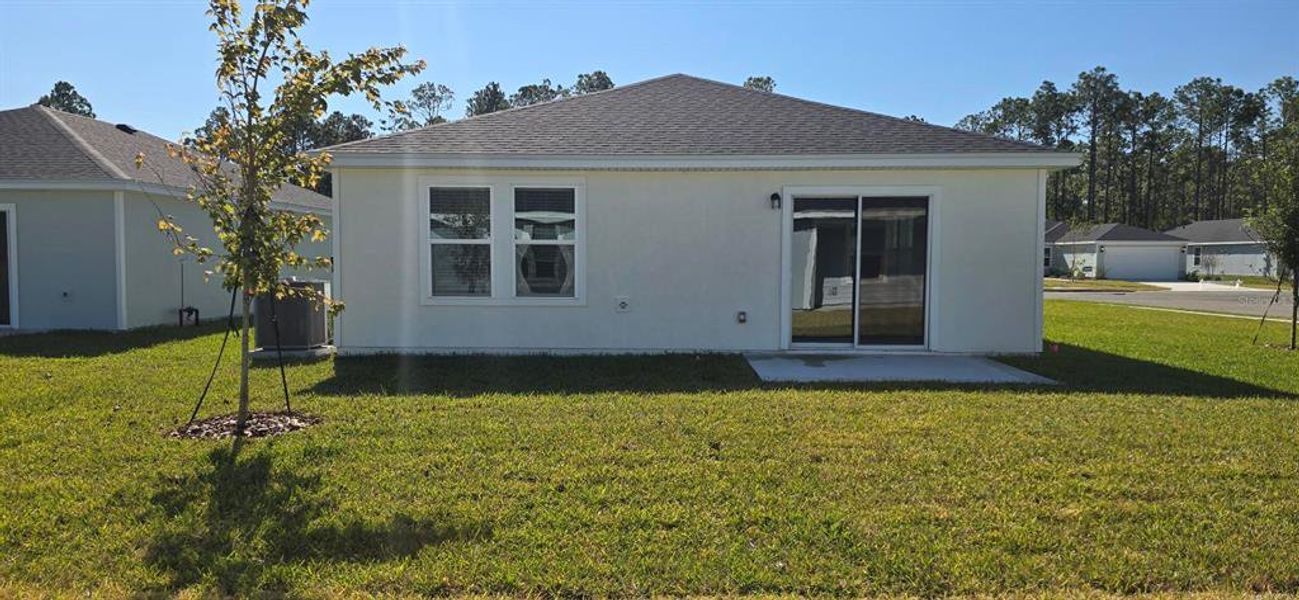 Exterior details and patio area of a home in Flagler Village - Classic Series, Palm Coast (Image 2).