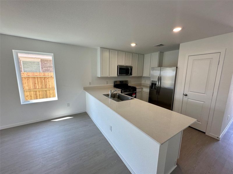 Furnished interior view inside a new home in Jones Creek Reserve, Richmond (Image 9).