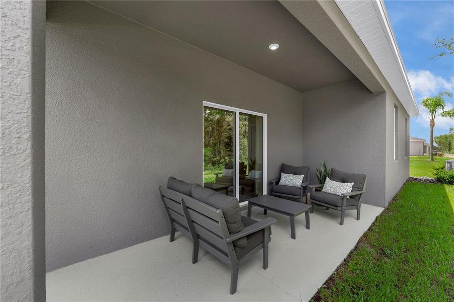 Exterior details and patio area of a home in Green Leaf, West Melbourne (Image 21).