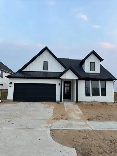 Front exterior of a new home in , Richmond, TX, highlighting curb appeal (Image 2). Front exterior of a new home in , Richmond, TX, highlighting curb appeal (Image 2).