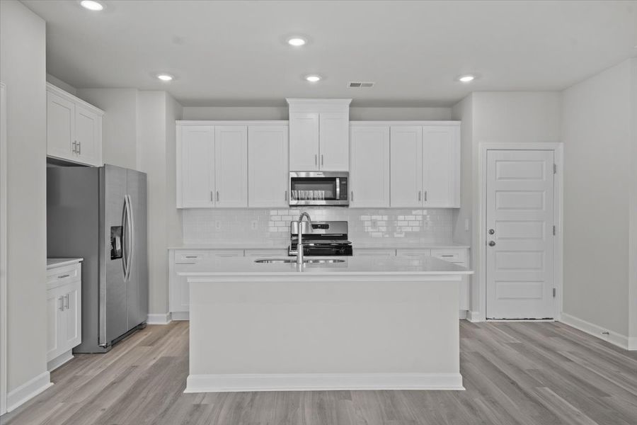 Furnished interior view inside a new home in Village at White Pine, Pendleton (Image 5).