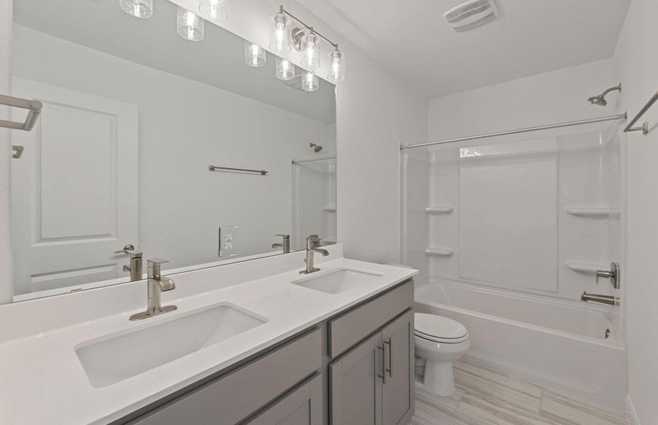 Furnished interior view inside a new home in Patterson Ranch, Georgetown (Image 8). Furnished interior view inside a new home in Patterson Ranch, Georgetown (Image 8).