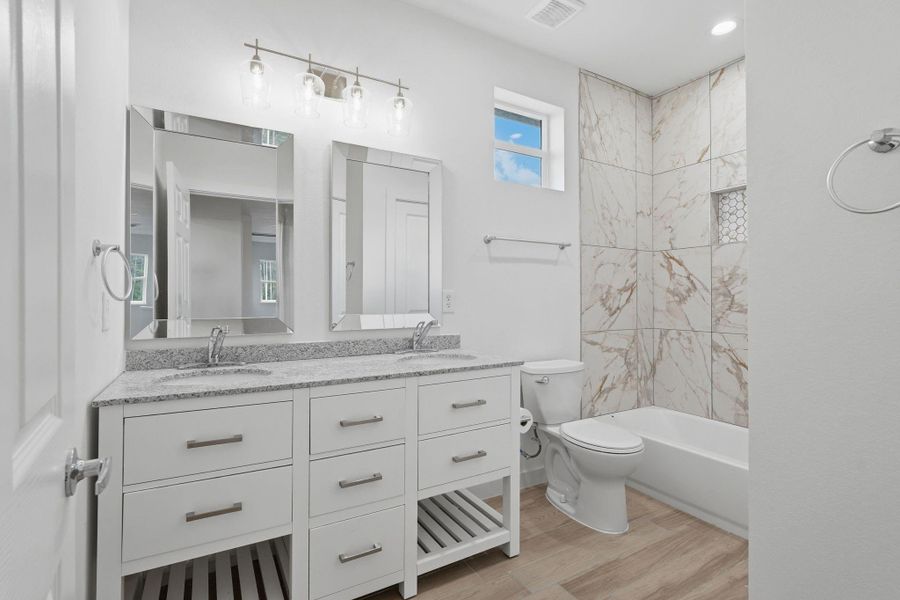 Furnished interior view inside a new home in , Conroe (Image 13).