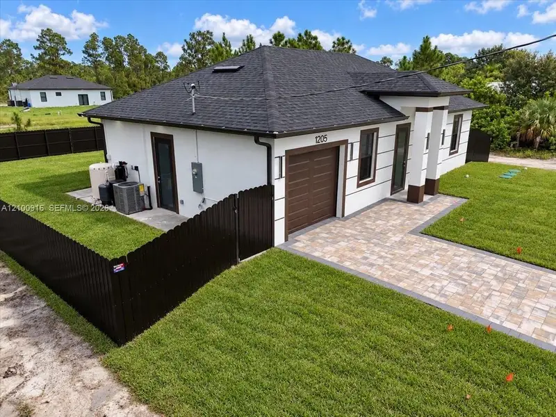 Exterior details and patio area of a home in , Lehigh Acres (Image 28).
