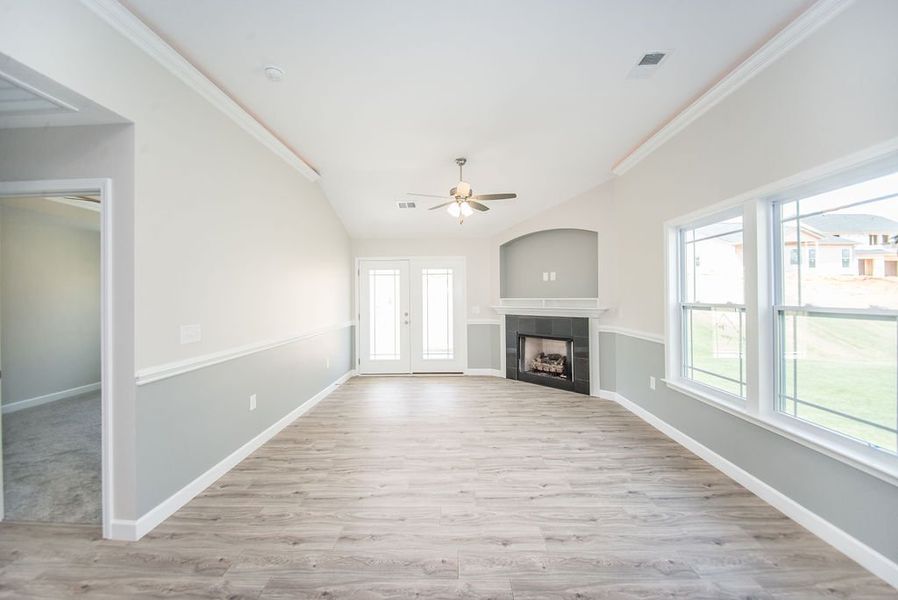 Representative unfurnished interior of a home built from the Quincy by Enchanted Homes in Lonesome Dove, San Antonio (Image 32).