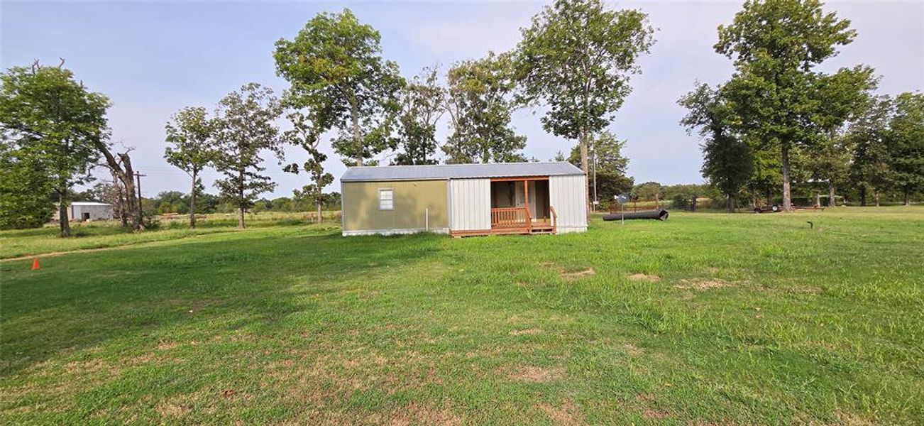 Front exterior of a new home in , Yantis, TX, highlighting curb appeal (Image 10).
