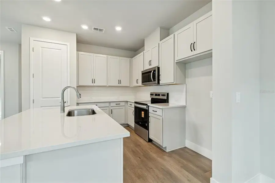 Furnished interior view inside a new home in , Parrish (Image 15).