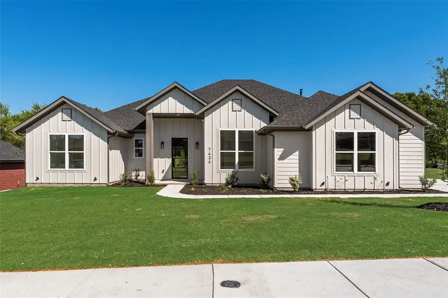 Front exterior of a new home in , Dallas, TX, highlighting curb appeal (Image 5).