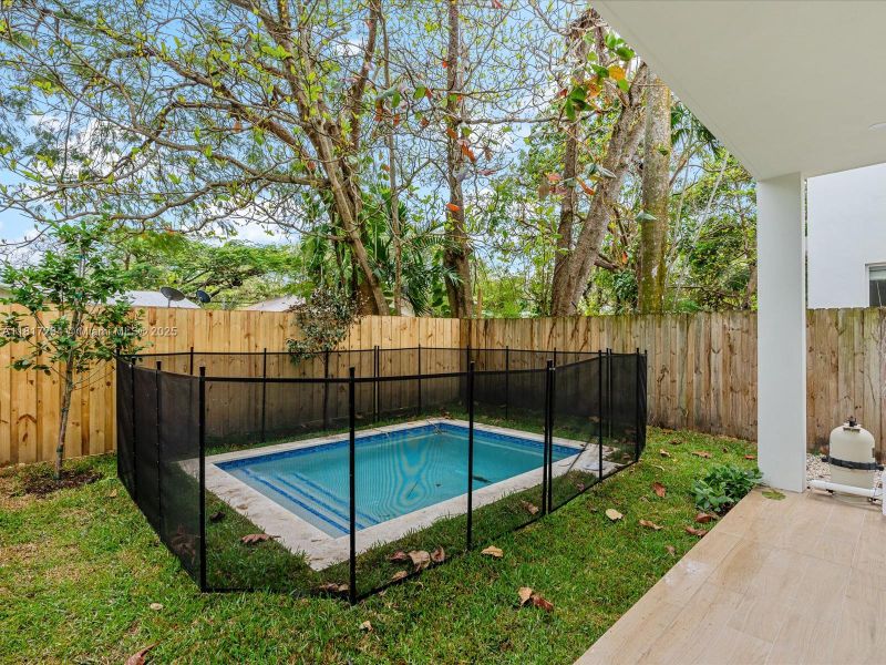 Exterior details and patio area of a home in , Miami (Image 4).