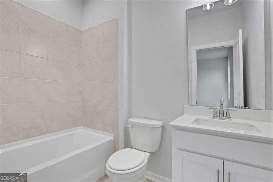 Furnished interior view inside a new home in The Paddocks at Doc Hughes, Buford (Image 14).