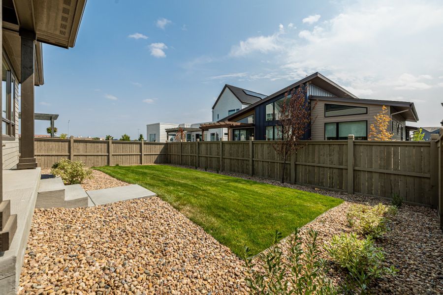 Front exterior of a new home in West Grange, Longmont, CO, highlighting curb appeal (Image 26).