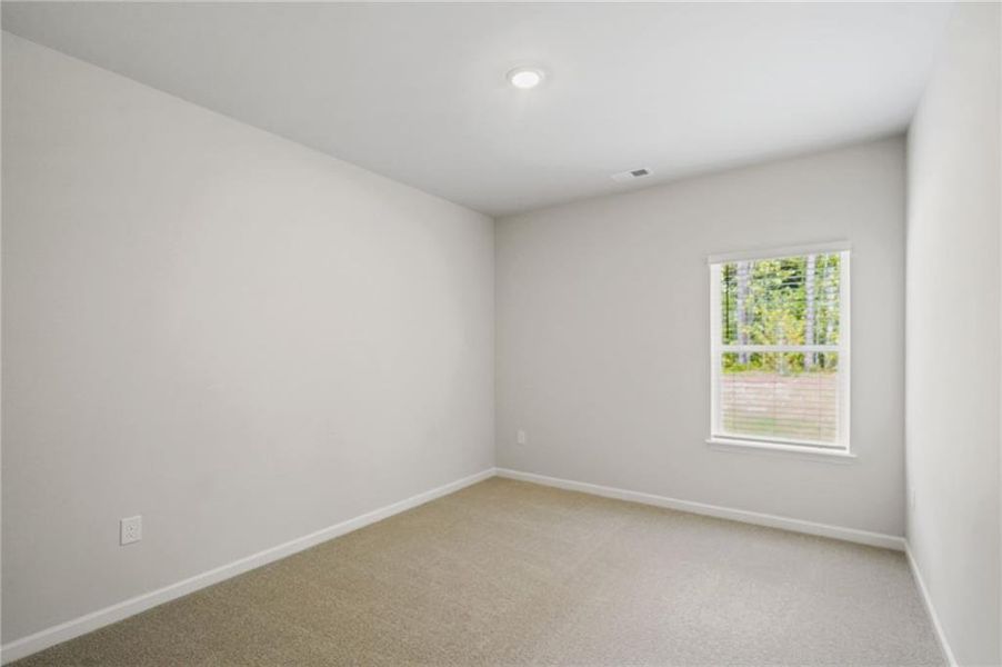 Spacious, unfurnished interior of a new home in Westmont Preserve, Powder Springs (Image 28).