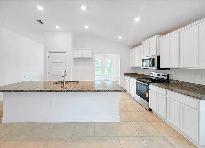 Furnished interior view inside a new home in , St. Cloud (Image 4).