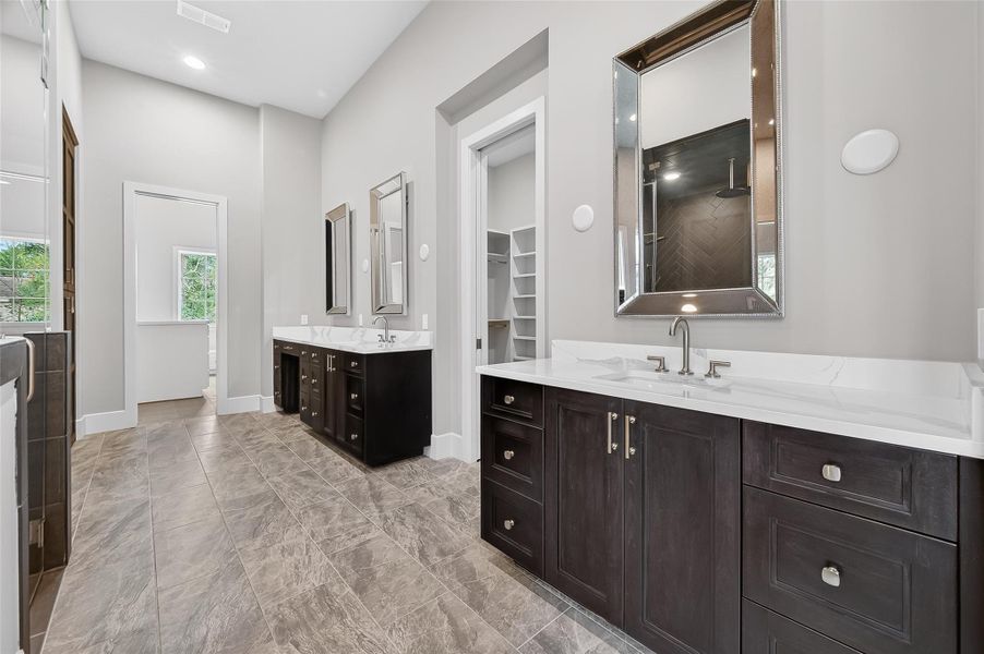 The primary bathroom offers a luxurious experience. The primary bathroom offers a luxurious experience.